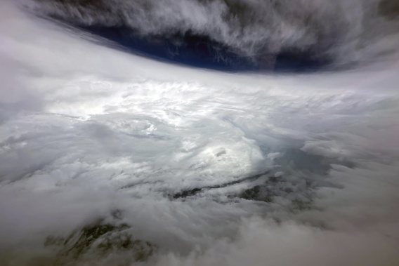 In this photo released by Hong Kong's Information Services Department, super typhoon Saola is seen from a Challenger 605 fixed-wing aircraft dispatched by the Government Flying Service near Hong Kong on Friday, Sept. 1, 2023. Photo via AP