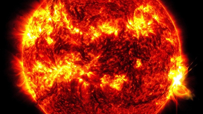 This image provided by NASA's Solar Dynamics Observatory shows a solar flare, the bright flash at right, on Tuesday, May 14, 2024. Photo / NASA/SDO via AP