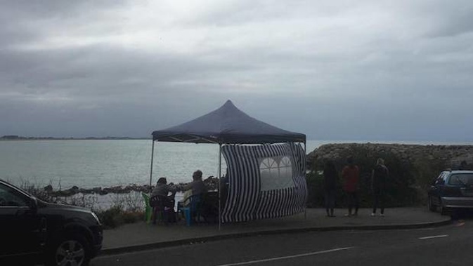 A gazebo has been raised at Scarborough boat ramp to help sustain those searching for Jack Sutton, 14, who disappeared while swimming at Scarborough Beach on Monday. (Photo / Givealittle)