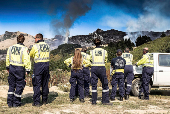 Fire crews watching the blaze unfold a year ago. (Photo / File)