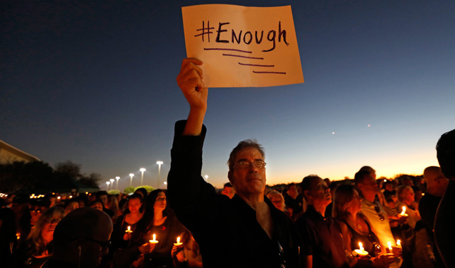 Thousands gathered for an evening vigil at Pine Trails Park in Parkland, Florida to remember those where were killed and injured in the shooting (Getty Images) 