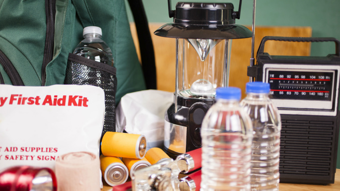 Make sure you have enough food and water for three days, essential medications, torches and radios with batteries, car phone charger, baby supplies, camping stove, first aid kit and pet supplies. (Photo \ Getty Images)