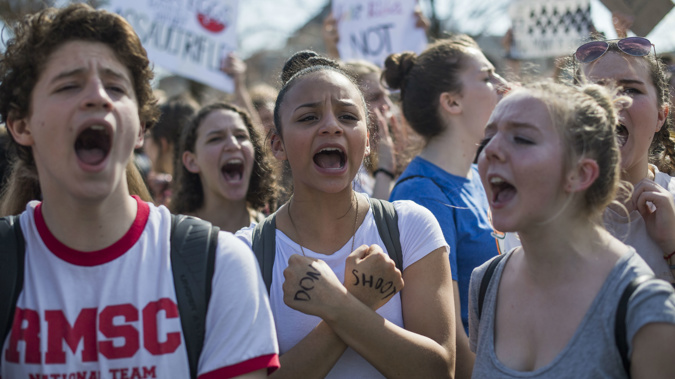 Students who are fed up seeing their fellow classmates massacred. They seem to have momentum. Which is good, political change doesn’t come without political pressure, and the larger the body of voices the more likely it is to be heard. (Photo \ Getty Images)