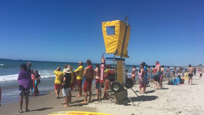 People at Papamoa Beach were called in from the water after two bronze whaler sharks were sighted this afternoon. Photo / NZ Herald