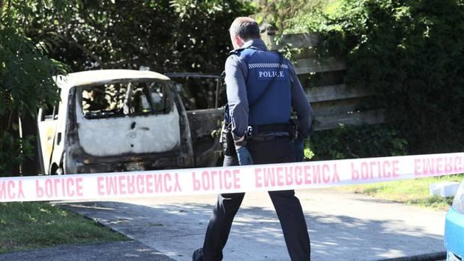 The woman had to be dragged out by a bystander. (Photo / NZ Herald)