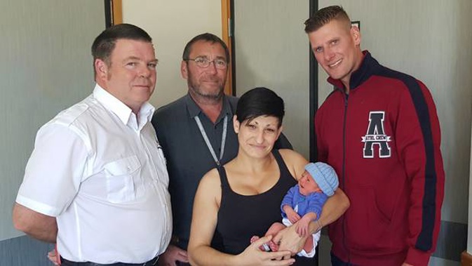 Essy van Blerk, centre, gave birth to her son, Blake, in a storeroom in Christchurch Hospital after her husband, Deon, right, missed the entrance of the Women's Hospital. Photo / Supplied