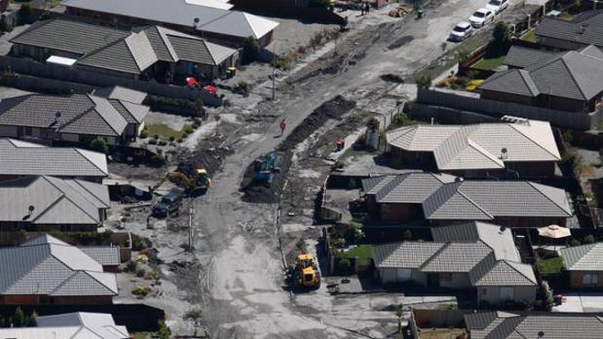 A street in Bexley covered in liquefaction. (Photo \ Brett Phibbs)