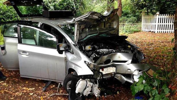 The car left the road and hit a tree front on causing critical injuries to the driver. Photo / Christchurch Star