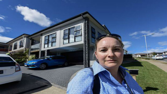 Evacuee Jenny Coffey has to get out of her house at The Lakes in Tauranga before Cyclone Hola arrives. (Photo: George Novak)