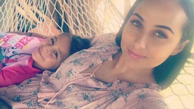 Brooke Stevens and her daughter, who was recovering from surgery when the car was stolen. (Photo / Facebook)