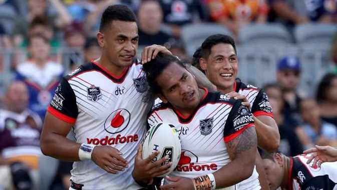 Solomone Kata (right) of the Warriors is congratulated after scoring a try in round one. (Photo / AAP)