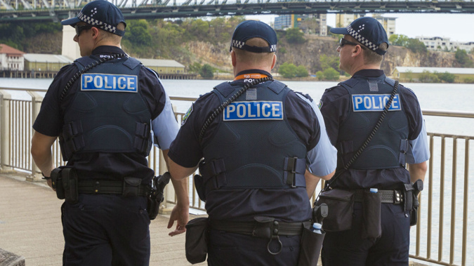 Brisbane police have arrested five people after a man was 'thrown' from a balcony. (Photo \ Getty Images)