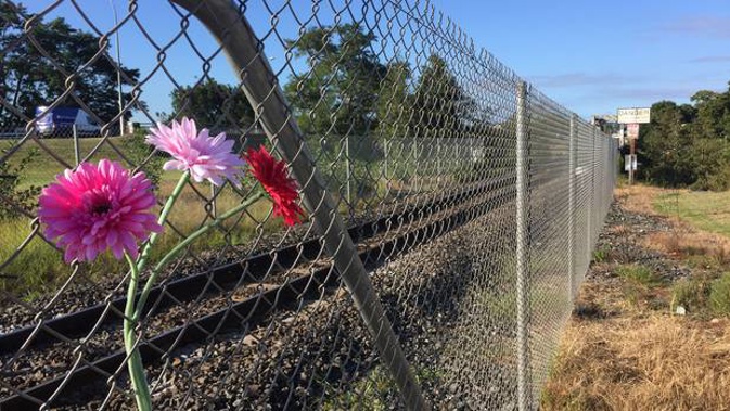 Flowers at the scene of where an 11-year-old was killed by a train in Ngaruawahia on Sunday. (Photo / Belinda Feek)