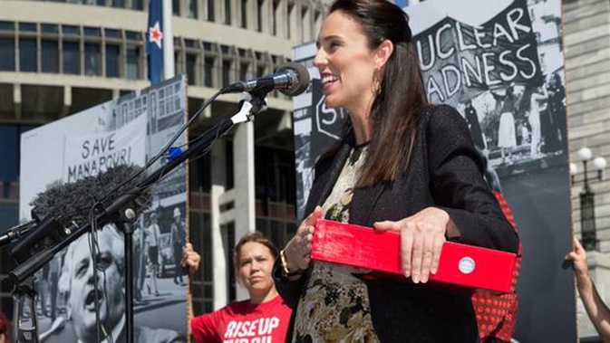 Prime Minister Jacinda Ardern speaking after receiving the End Oil petition from Greenpeace NZ at Parliament. Photo / Mark Mitchell