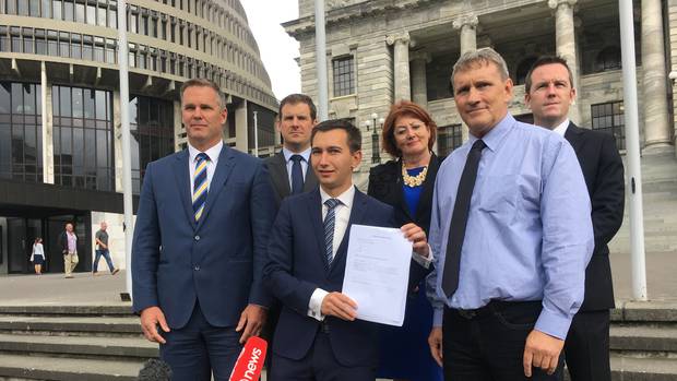 Lewis Jones delivers a petition supporting tougher penalties for supplying synthetic cannabis to National MPs. (Photo / Derek Cheng)