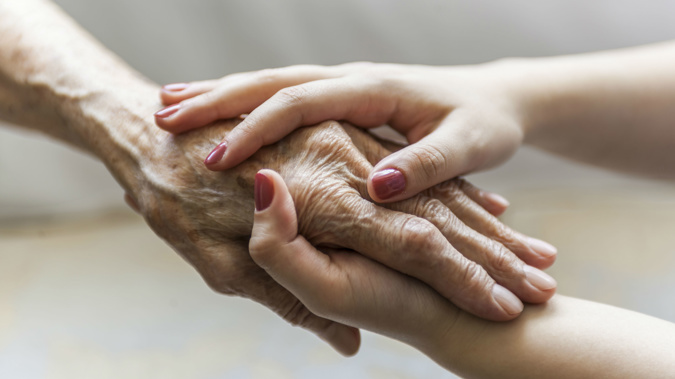 Rest home carers do a valiant job but many are overworked, says Grey Power. (Photo \ Getty Images)