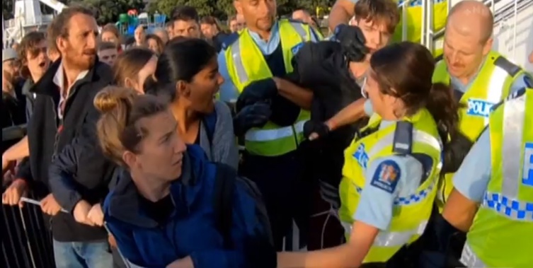 One protester was elbowed five times by a female police officer. (Photo / Newshub)