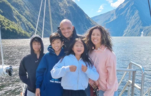 Tegan Chen (centre) with her family before her death.