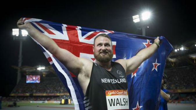 New Zealand's Tom Walsh celebrates after winning Gold in the Men's Shot Put at Carrara Stadium. (Photo / Greg Bowker)