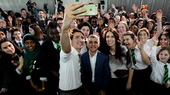 Jacinda Ardern had a rockstar reception with Justin Trudeau and Sadiq Khan. (Photo / AP)
