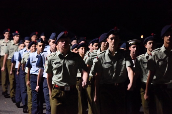 ANZAC soldiers march at dawn. (Photo/ George Novak)