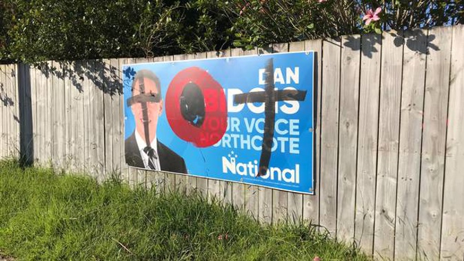 National Party candidate Dan Bidois' byelection billboards in Northcote were defaced overnight. (Photograph/ Supplied)