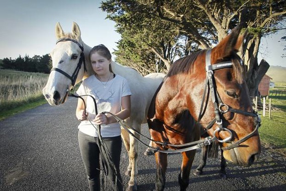 Keiasha McGhie who is being harassed by drones when riding her horses. LR Stan Georgie. The horses have been traumatised (Photograph / Warren Buckland)