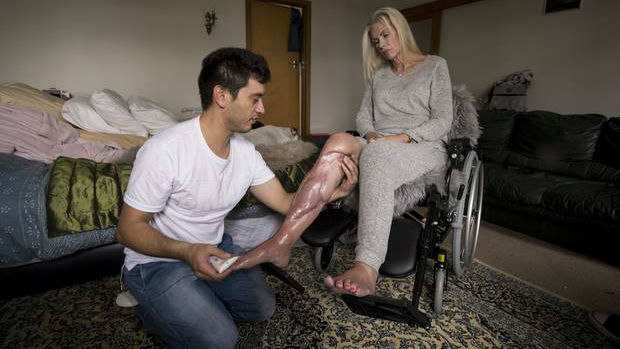 Josephine Ganley's partner Aaryn Paenga has been caring for her and her injuries since the accident last year. (Photo / Dean Purcell)