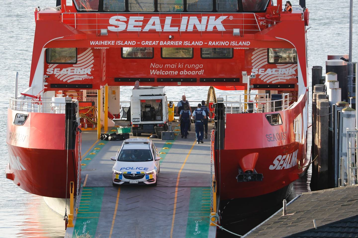 Police on the Sealink ferry at the Half Moon Bay ferry terminal. Photo / Dean Purcell