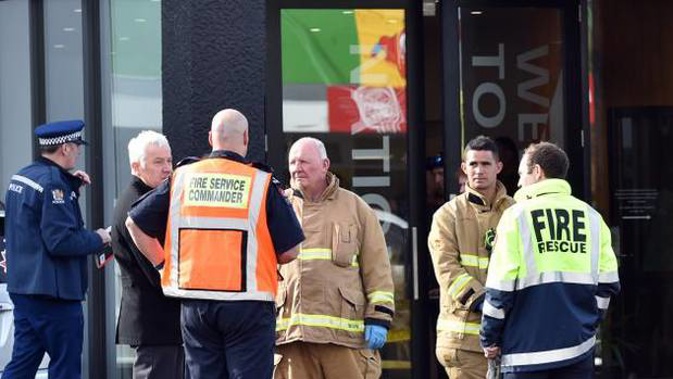 Emergency services at the scene in South Dunedin earlier today. (Photo / Peter McIntosh)