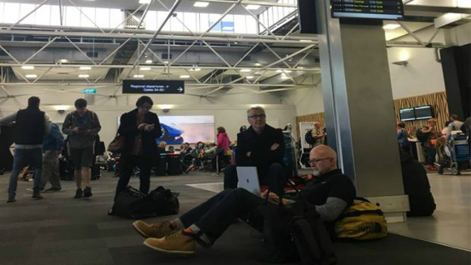 Shaun Burton, in the foreground. His flight has since been cancelled. (Photo: Edward Rooney)