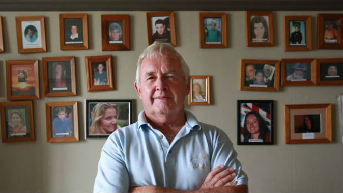 Sensible Sentencing Trust founder Garth McVicar in front of a wall of victims of crime. (Photo / Duncan Brown)