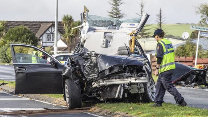 Police at the scene of the crash on Ti Rakau Drive in Auckland on Sunday morning. (Photo / Greg Bowker)