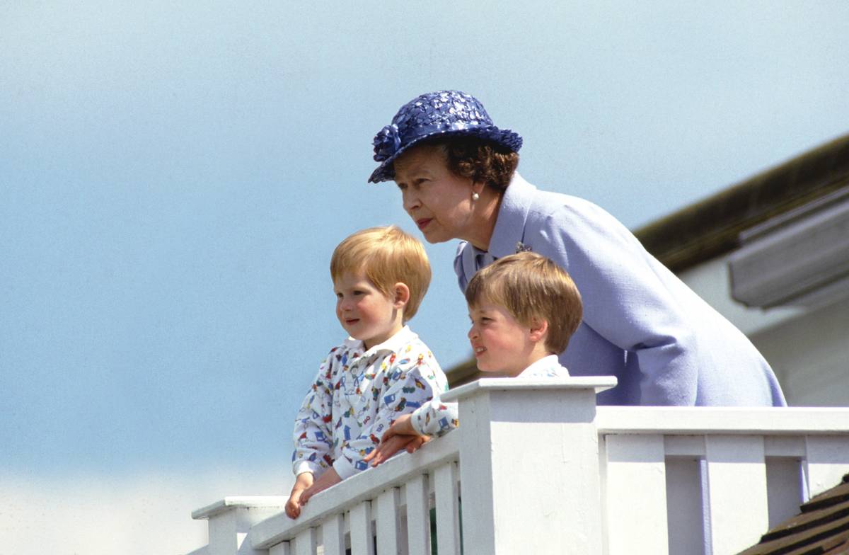 Queen Elizabeth II with her grandsons Prince WIlliam and Prince Harry (Photo \ Getty Images)