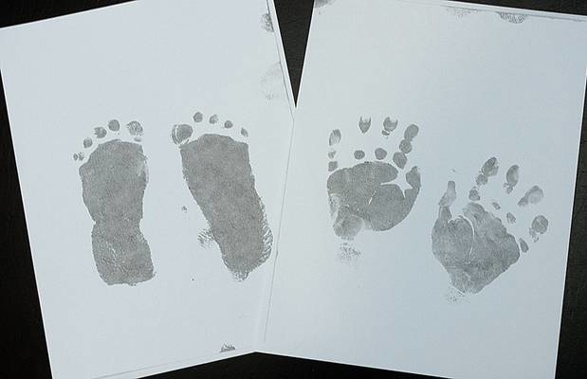 The parents of a newborn baby who died in hospital after a horrific crash took hand and foot prints of their child to remember him. (Photo / Supplied)