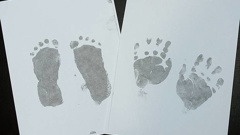 The parents of a newborn baby who died in hospital after a horrific crash took hand and foot prints of their child to remember him. (Photo / Supplied)