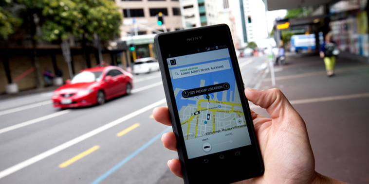 Perth man says he feels "violated" after his Uber driver sent him a "creepy text" message. (Photo/ NZ Herald)