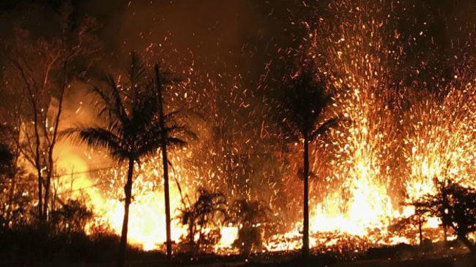 A new fissure erupts in Leilani Estates in Pahoa, Hawaii. (Picture: AP Source:AP)