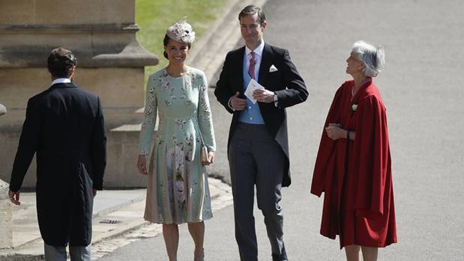Pippa Middleton and her husband James Matthews arrive for the wedding ceremony of Meghan and Harry. (Photo / AP)