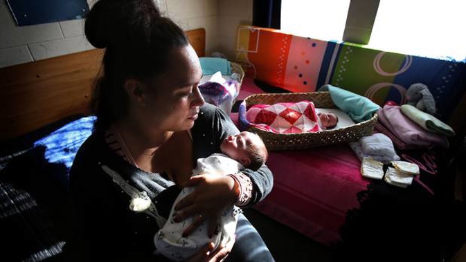 Kristal Heke holds daughter Heaven-Leigh with Indiana-Nova asleep in the background. (Photo / John Borren)