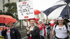 Auckland nurses marched in the rain at an earlier strike. Photo / Greg Bowker