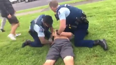A 13-year-old is punched by a police officer in Pakuranga. (Video: Supplied)