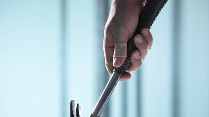 Warren Cowley then retrieved a claw hammer from his room and brandished it at his victim. (Photo / Getty)