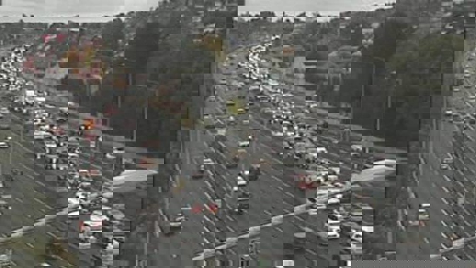 Police said the fire is clear of lanes but it appears to have slowed traffic. Photo/file