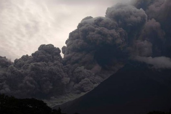 Volcan de Fuego, or Volcano of Fire, blows outs a thick cloud of ash, as seen from Alotenango, Guatemala. Photo / AP
