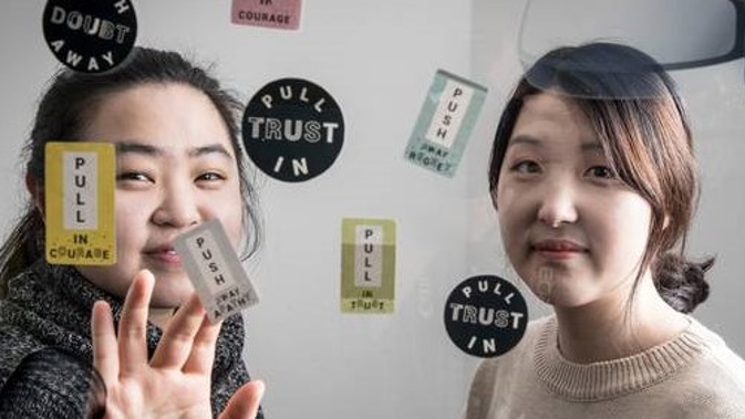 Organisers Tina Inah Kim, left, and Sarah Song Min Lee are organising Message of Hope stickers for suicide prevention. Photo / Michael Craig