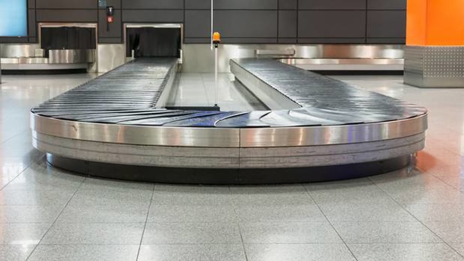 The toddler reportedly climbed onto the belt which carries luggage from the check in area to the security clearance area and was carried some distance. (Photo / 123RF)
