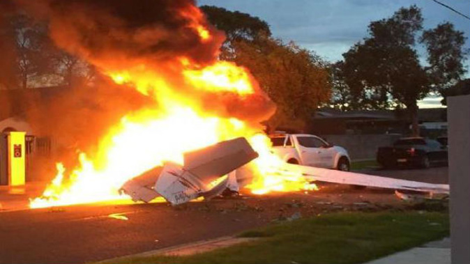 The light plane crashed onto a street. (Photo: Channel 7)