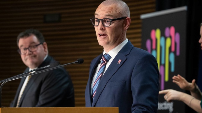Commerce and Consumer Affairs Minister David Clark announcing the Government's response to the Commerce Commission's supermarkets report with Finance Minister Grant Robertson. Photo / Mark Mitchell