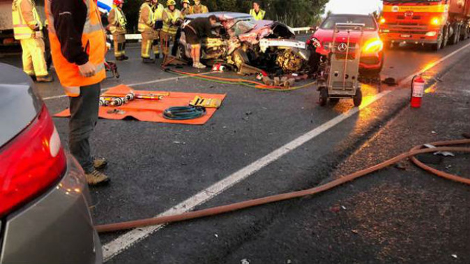Several cars have been involved in a collision at the intersection of Dairy Flat Highway and Coatesville-Riverhead Highway this morning. (Photo: Supplied)